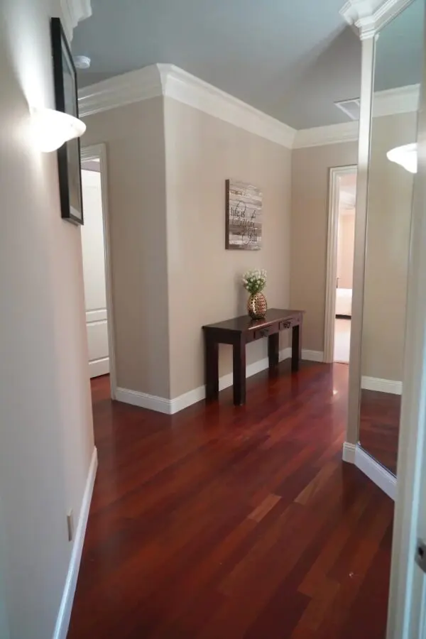 A Panel Wood Floor for a Cream Walled House