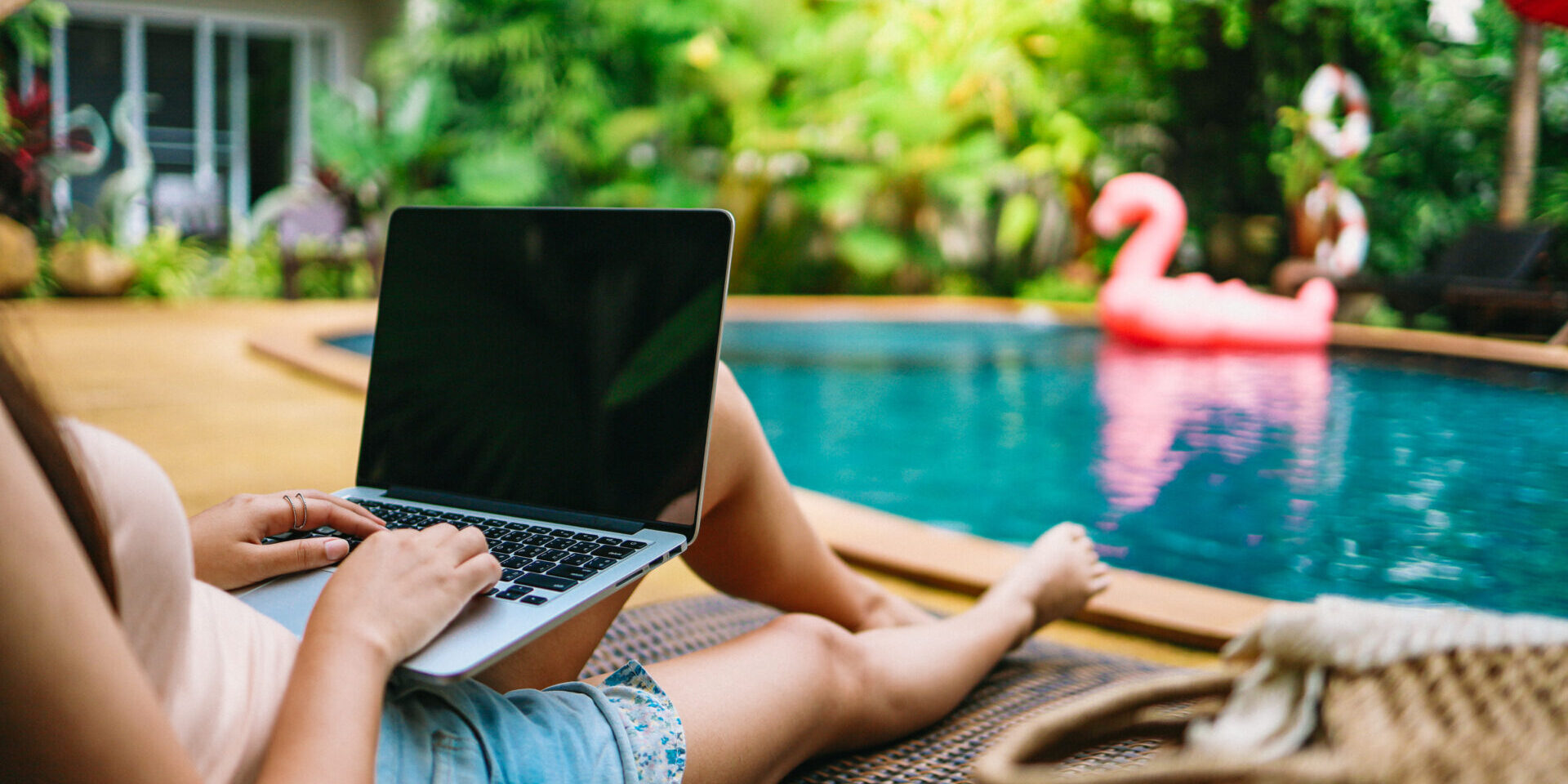 Vacation Traveling Laptop Technology Concept Woman working on her laptop in holiday  remote online working digital Freelance work concept